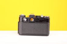 Load image into Gallery viewer, Zenit TTL 35mm Film SLR Camera with Pentacon Multi-Coating 50mm f/1.8 Lens
