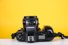 Load image into Gallery viewer, Nikon AF F801 35mm SLR Film Camera with 50mm f1.8
