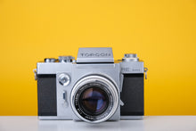 Load image into Gallery viewer, Topcon RE Super with 35mm SLR Film Camera with Kogaku 58mm f1.8 lens
