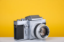 Load image into Gallery viewer, Topcon RE Super with 35mm SLR Film Camera with Kogaku 58mm f1.8 lens
