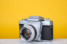 Load image into Gallery viewer, Topcon RE Super with 35mm SLR Film Camera with Kogaku 58mm f1.8 lens
