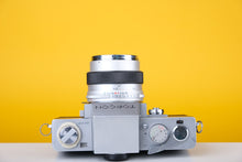 Load image into Gallery viewer, Topcon RE Super with 35mm SLR Film Camera with Kogaku 58mm f1.8 lens
