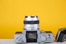 Load image into Gallery viewer, Topcon RE Super with 35mm SLR Film Camera with Kogaku 58mm f1.8 lens
