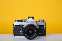 Load image into Gallery viewer, Olympus OM-1n 35mm SLR Film Camera with Zuiko 28mm f2.8 Lens
