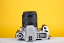 Load image into Gallery viewer, Canon EOS 300/Kiss III  35mm SLR Film Camera With Canon Zoom Lens 28-80mm f/4-5.6 Lens
