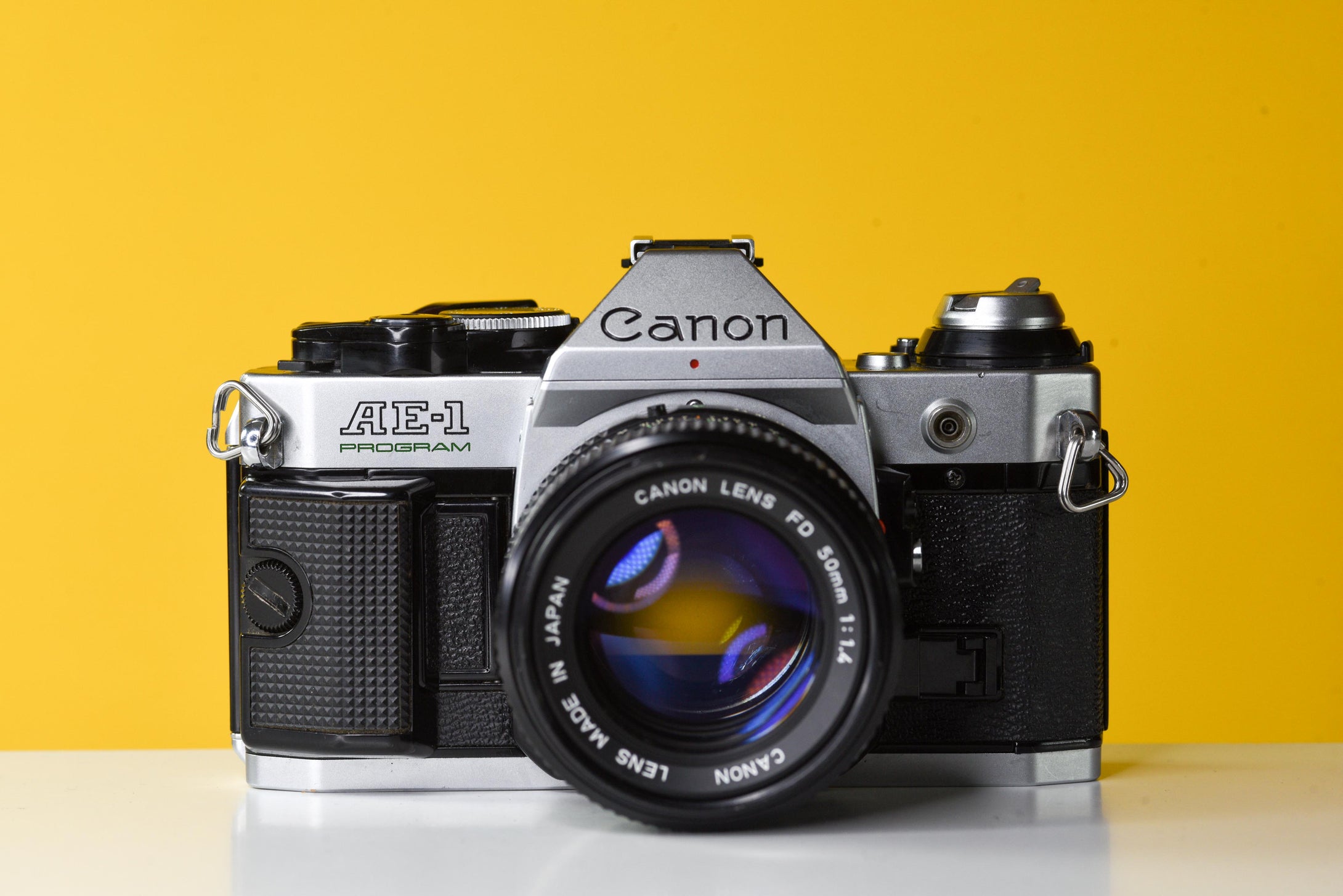 Canon AE-1 Program Silver 35mm Film Camera with Canon FD 50mm f